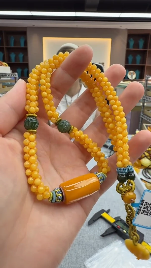 琥珀颈饰未镶嵌304秒拍号 假一罚三