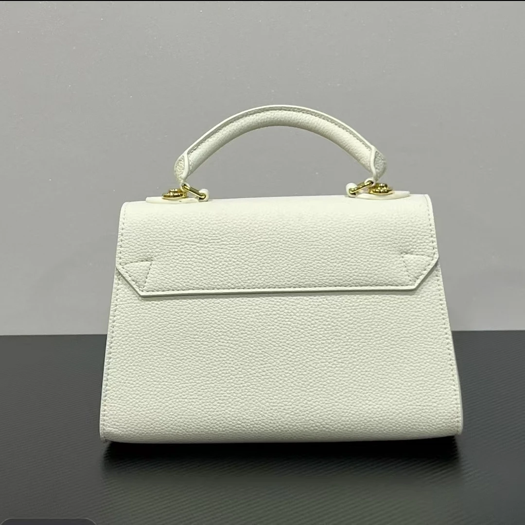 2661白色手提扭一扭包包百搭女士手提单肩斜挎包