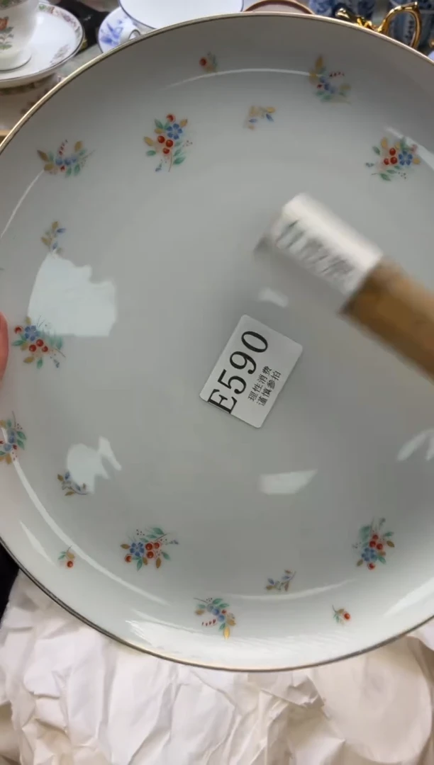 瓷片李****?       E590