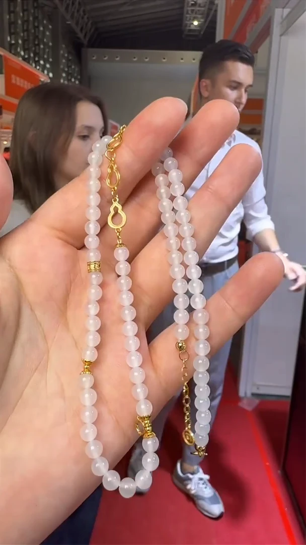 和田玉未镶嵌颈饰上海国际珠宝展假一罚十