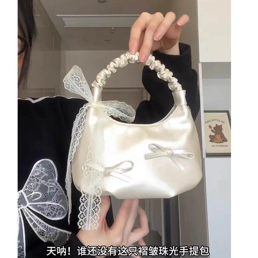 小众设计感蝴蝶结包包2025新款法式手提云朵包高级感单肩斜挎包女