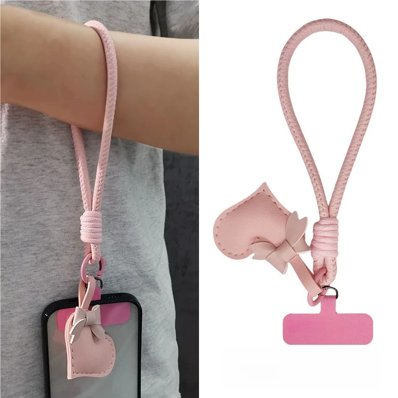 ins短款手机挂绳女手腕绳皮质蝴蝶结爱心挂件手机壳吊绳防丢配饰