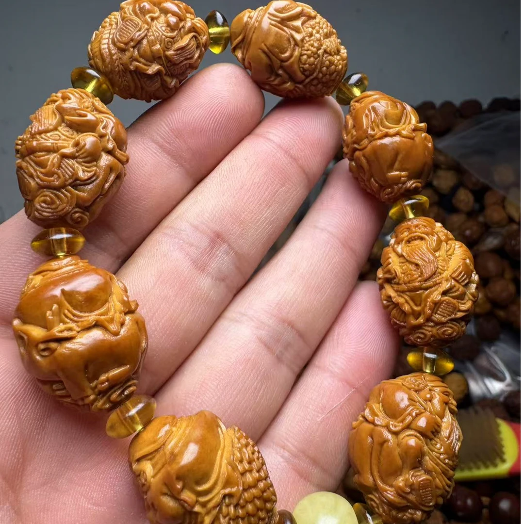 {闪购商品]橄榄核手串骑兽财神