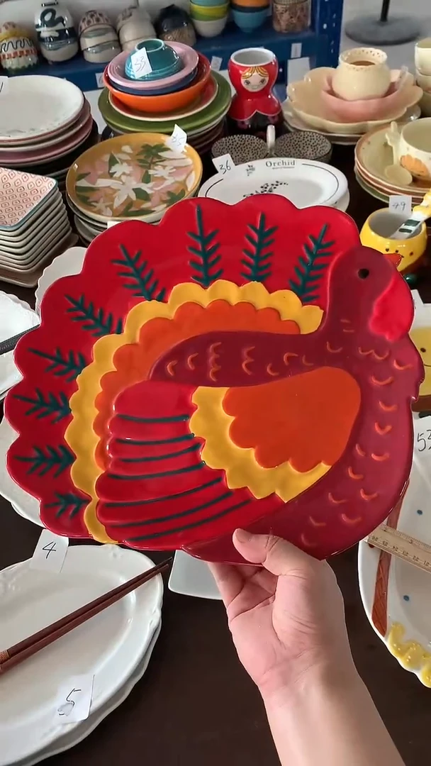 瓷微瑕红色异型火鸡盘