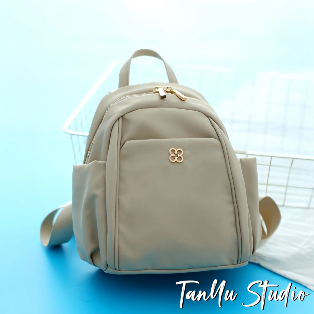 探屿户外小型背包防水逛街小书包轻便旅游双肩包女上班通勤妈咪包