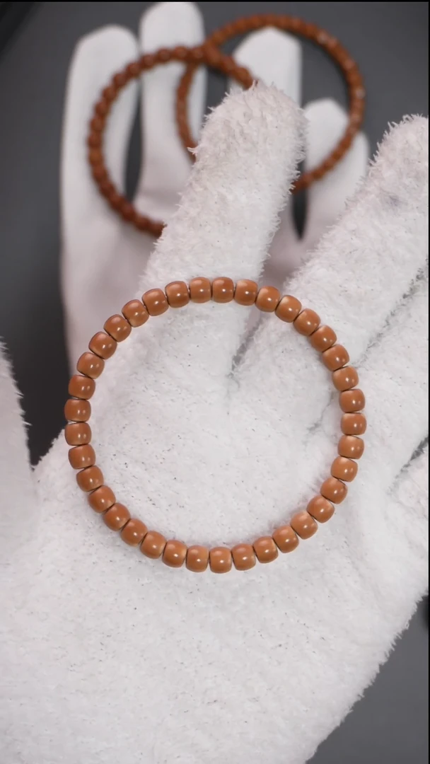 手串橄榄核  6.4mm老挝红核极限弧正三花微白核尖手串