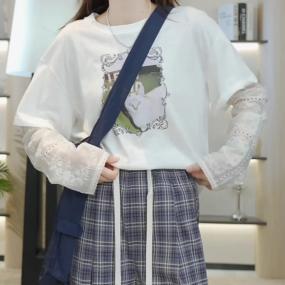 猫咪图案假两件拼接镂空网纱长袖T恤女夏季新款宽松设计感上衣
