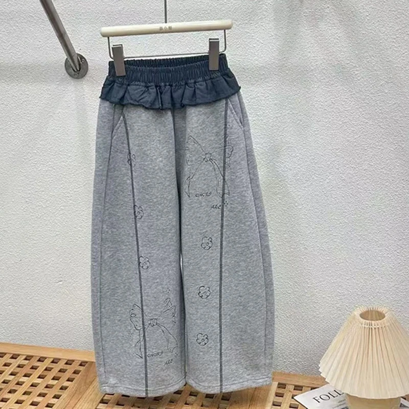 女童加绒蝴蝶结印花弯刀裤2025新秋冬洋气花边运动休闲卫裤香蕉裤