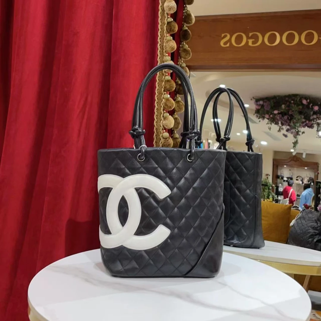 95新  Chanel/香奈儿 康鹏菜篮子小号黑白羊皮手拿手提包52803989