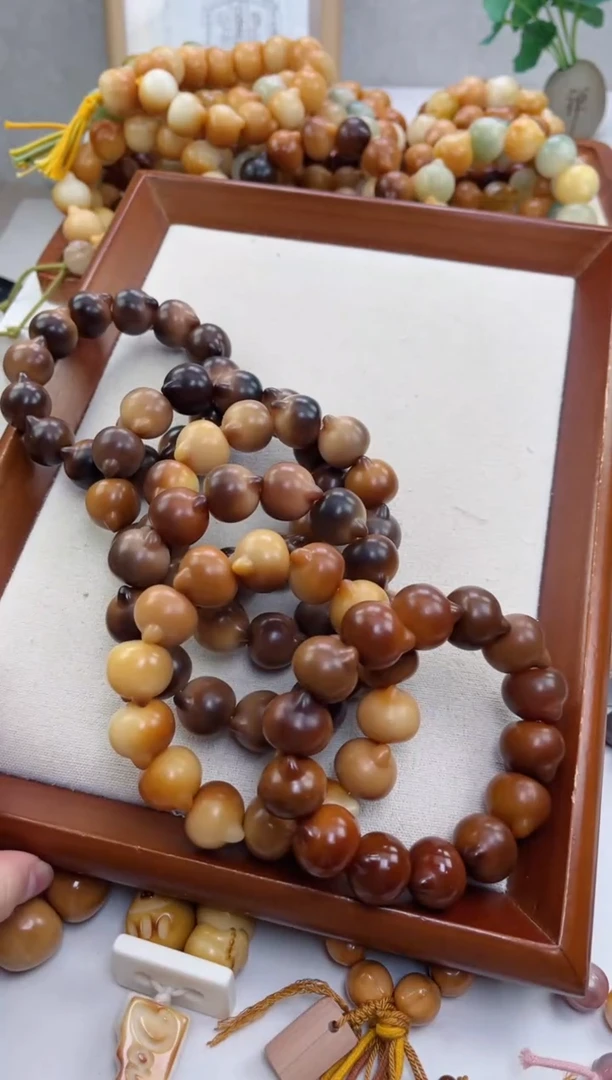 菩提根/象牙果手串g65干磨猫猫头20瑕疵不补随机