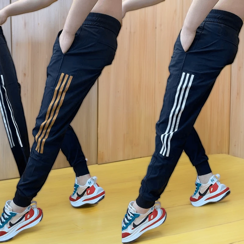新款潮男修身小脚裤韩版痞气百搭时尚男士休闲三条杠裤子