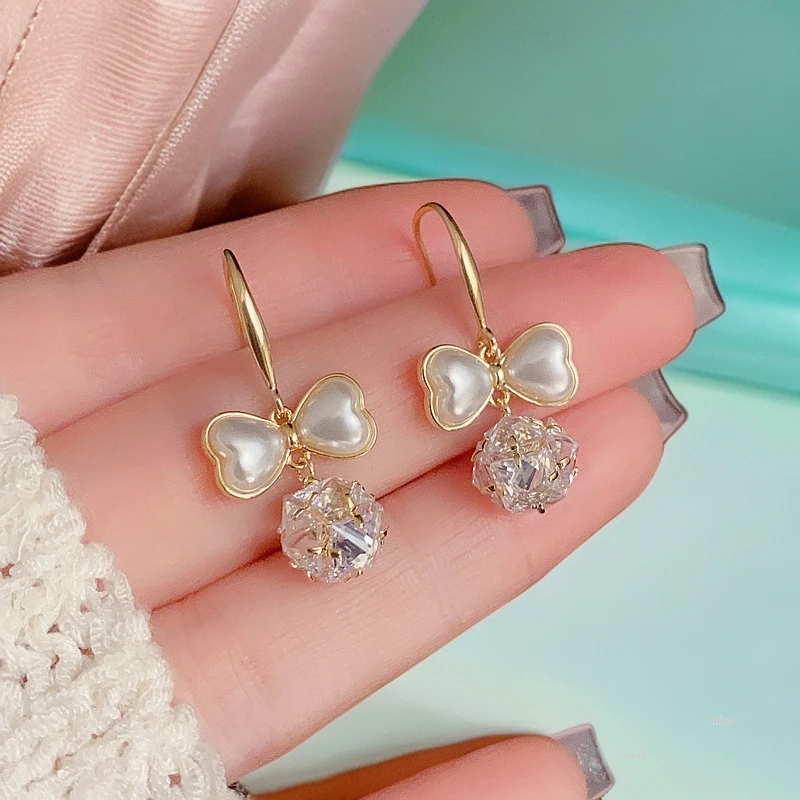 铜合金仿珍珠耳饰 晚会耳饰仿珍珠蝴蝶结球球流苏耳钩气质时尚