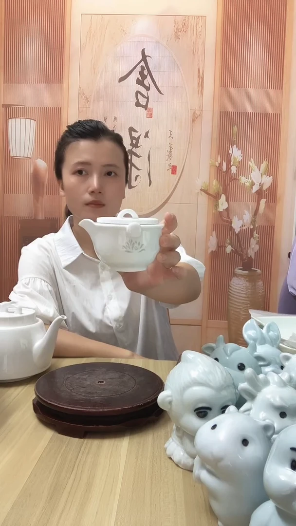 瓷玲珑公道茶壶1把