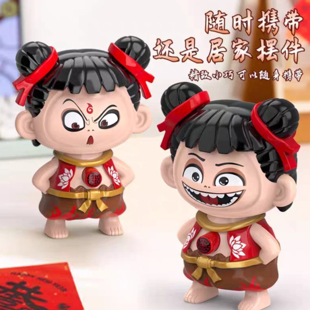 新年变脸哪吒表情包变脸魔童闹海玩具按压手办摆件小礼品挂件摆件