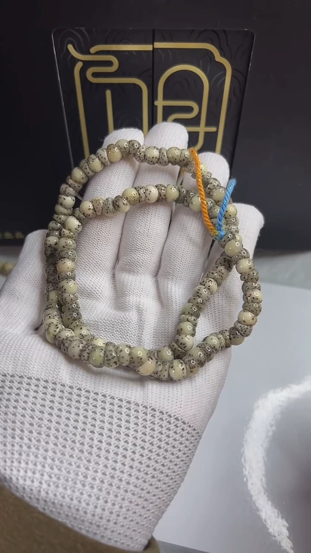 手串星月菩提小驼包7.a497