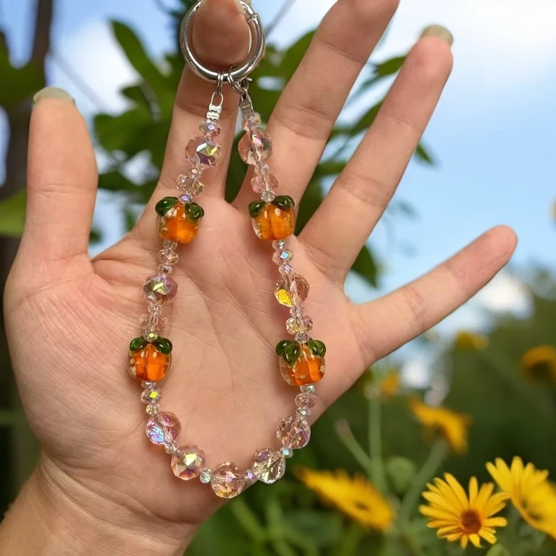 261粉色玻璃水晶柿柿如意手机链短款创意设计女款防丢挂饰