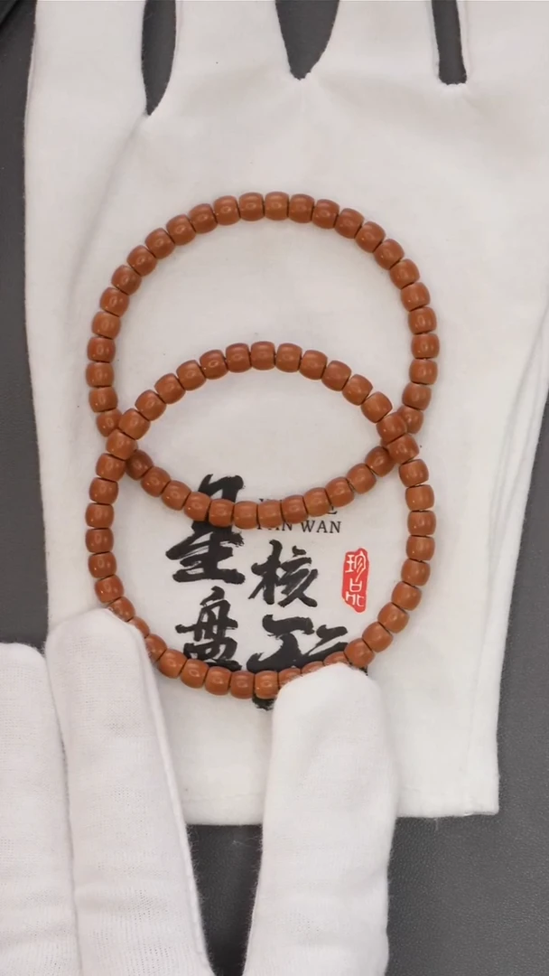 橄榄核手串星芒 6.0mm老挝红核直切微三花印记手串