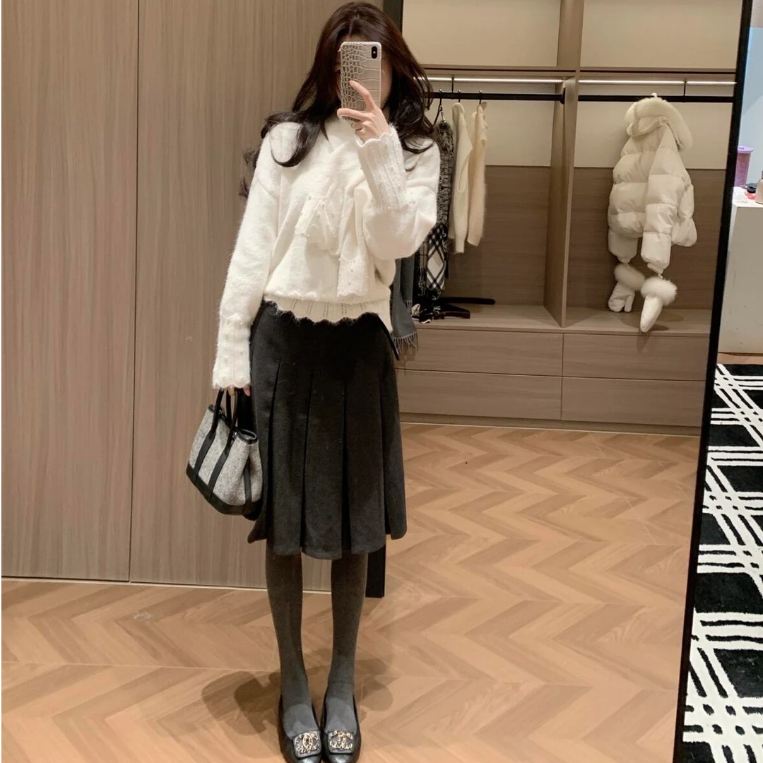 2026春季流行穿搭一整套针织上衣女设计感毛衣包臀半身裙子两件套