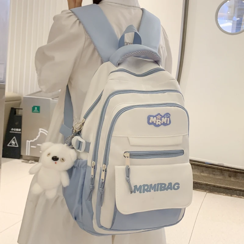 高颜值撞色书包女初中生大容量背包高中学生多层减负小学生双肩包