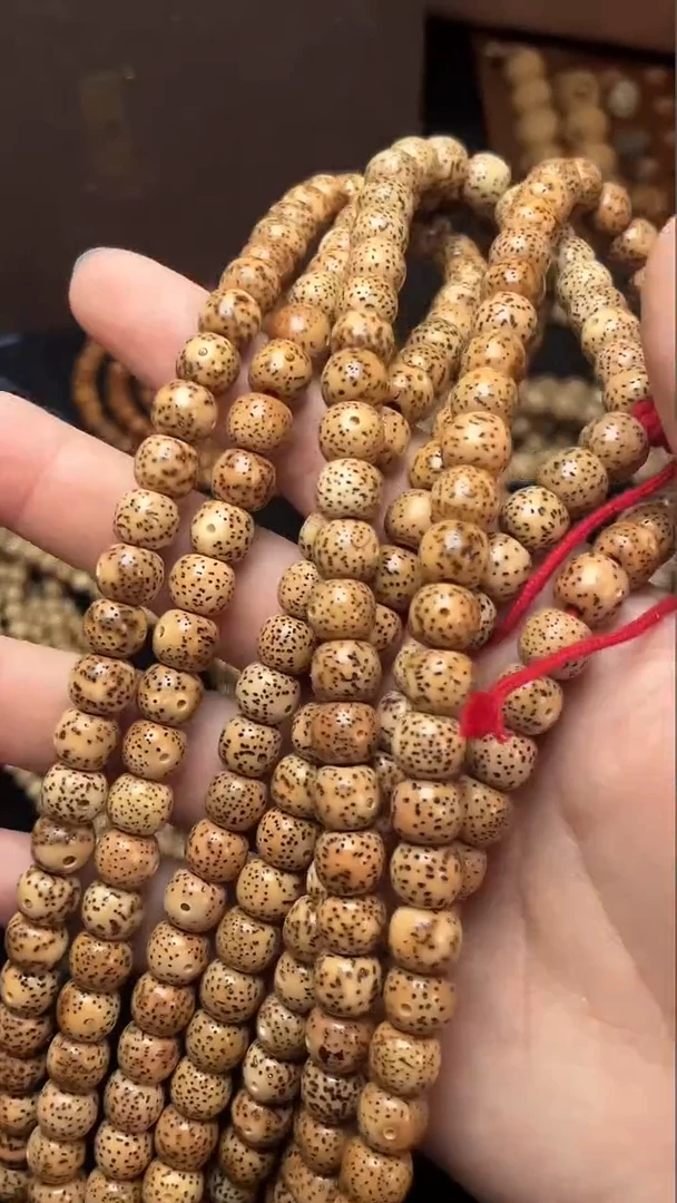 吊坠星月菩提精工级粉皮陈籽桶珠8*7长串（B）