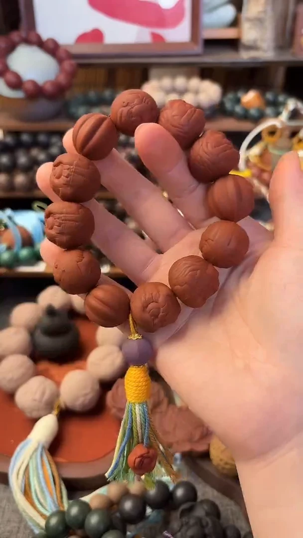 泥塑暖宫香多宝小手持一条