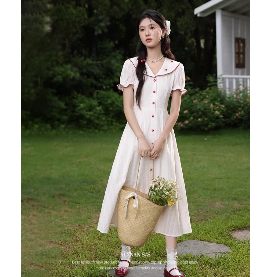 鹿向南「晴空琉璃」法式甜美度假风女夏季新款翻领米白色连衣裙