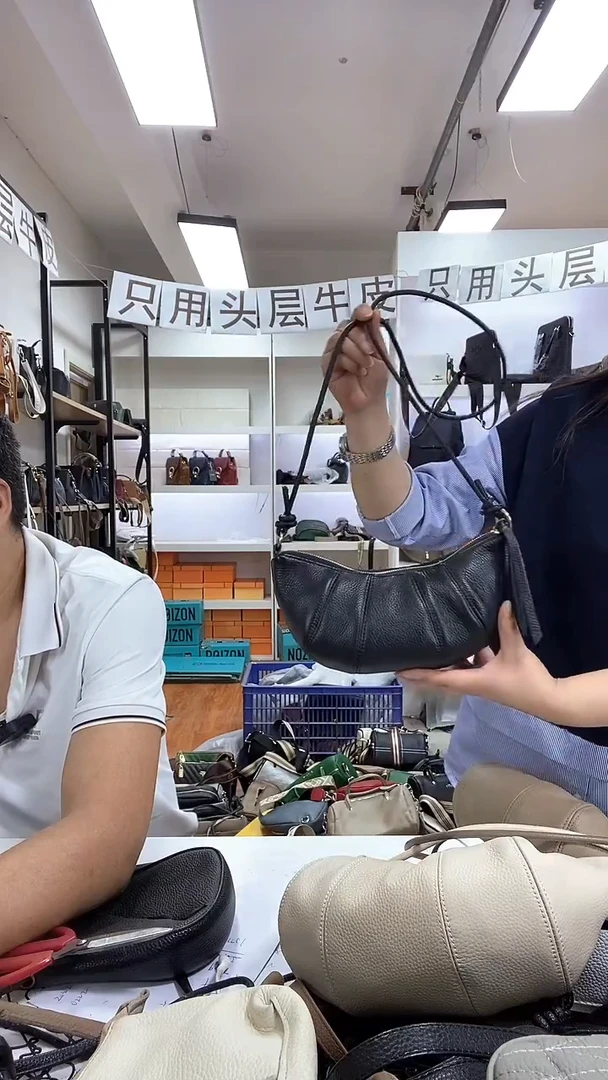 头层牛皮牛角包黑色