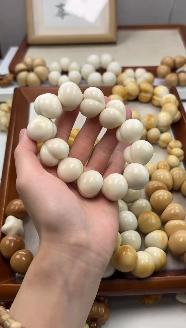 手串菩提根/象牙果象牙果瓷白爱心屁桃20*25mm手串瑕疵不补