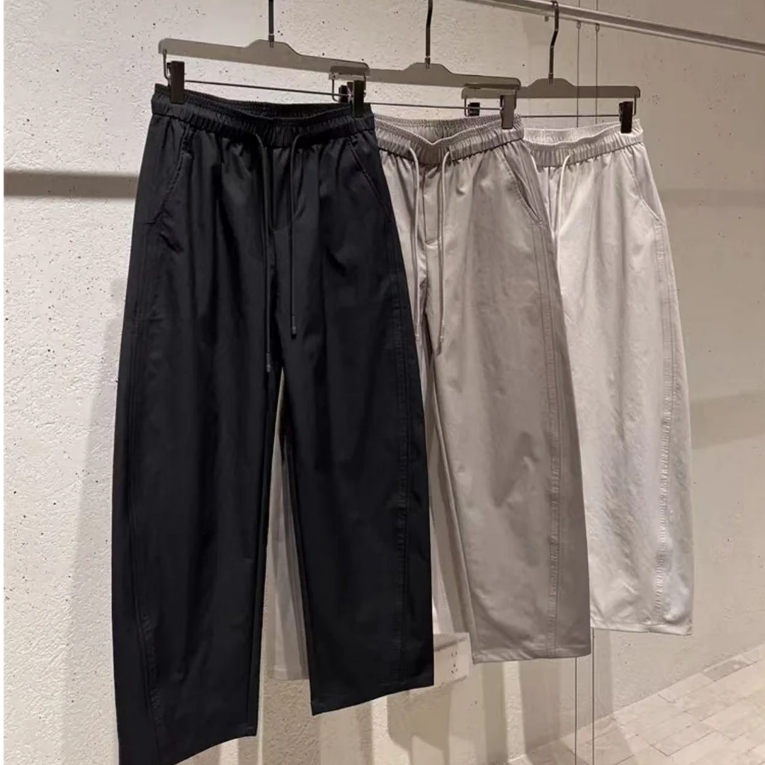 【素搭高级感】柔触潮流纯色简约百搭显瘦松紧腰宽松显高弯刀休闲裤