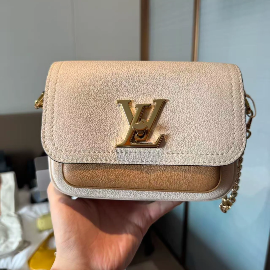 99新 LouisVuitton/路易威登 lv lockme 白色经典斜挎包/JM0005