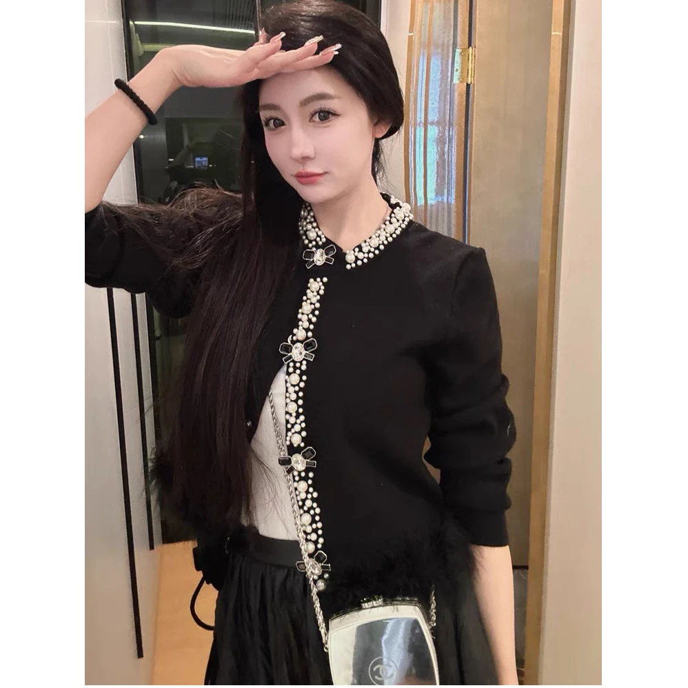 【现货秒发】-洋洋优选-秋冬新款单排珍珠钻下摆驼鸟毛外套YY70350