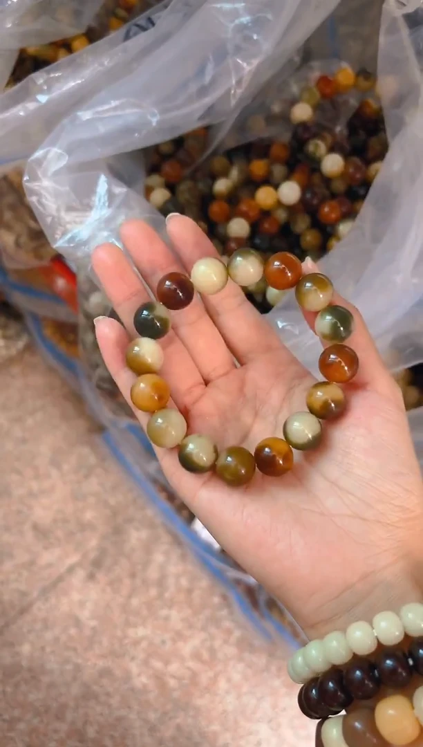 吊坠菩提根/象牙果花皮圆珠单圈手串
