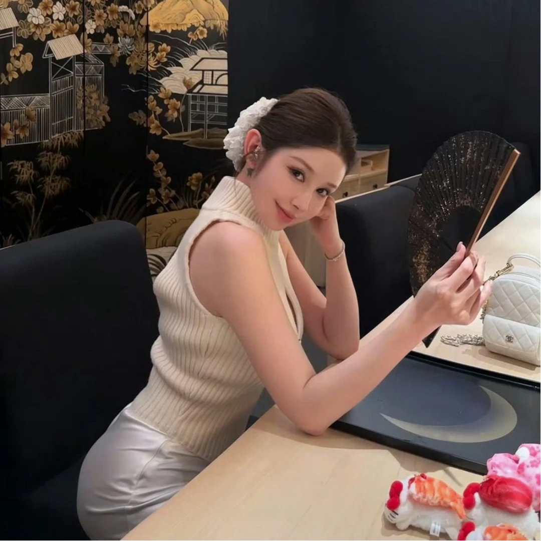 美式辣妹时尚设计感无袖镂空修身背心上衣女配显瘦高腰半身裙套装