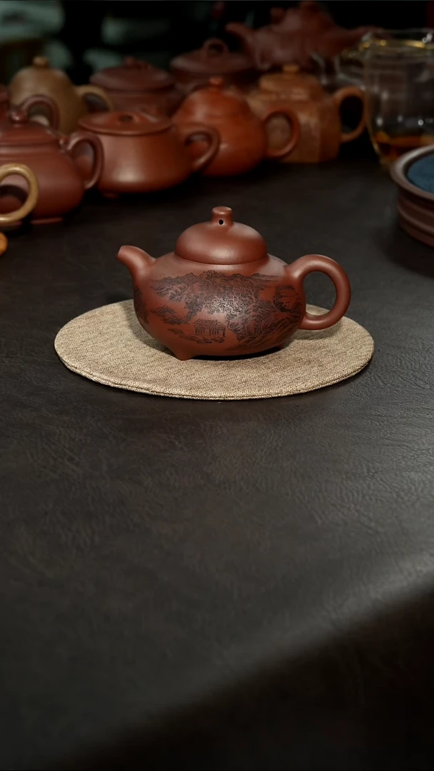 茶壶紫砂12底槽清山水刻绘三足乳鼎