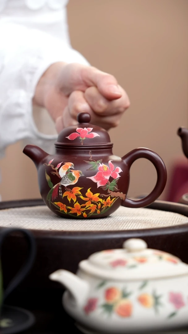 茶壶紫砂紫脂泥掇球泥绘双鸟