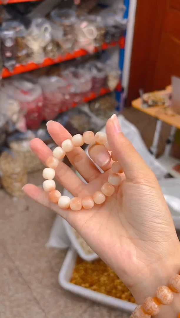 吊坠菩提根/象牙果粉色桶珠单圈手串