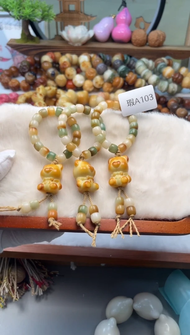 【闪购商品】菩提根/象牙果手串瑕A103炭烧熊15mm一串随机