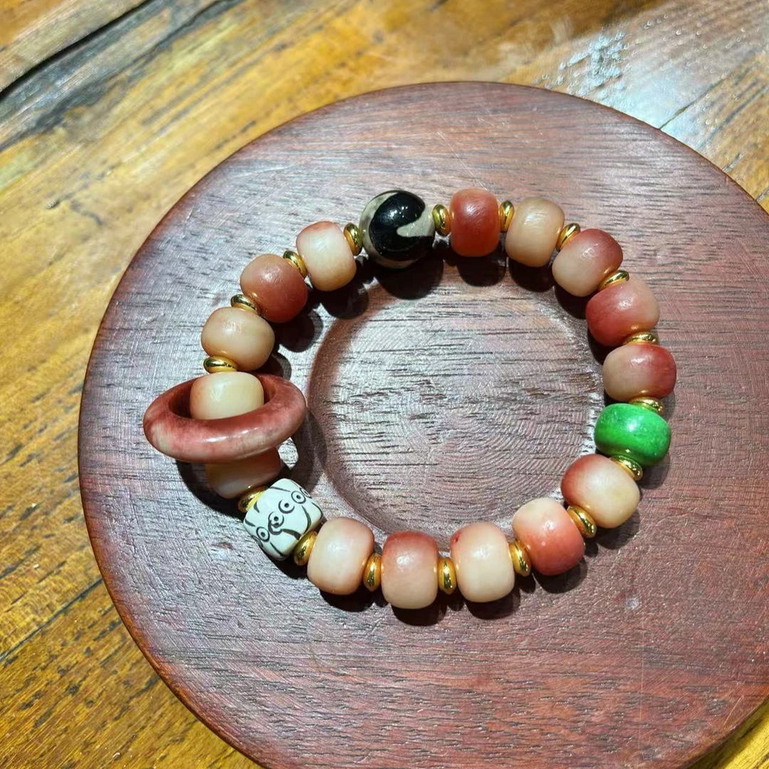 天然驼骨跑环手串