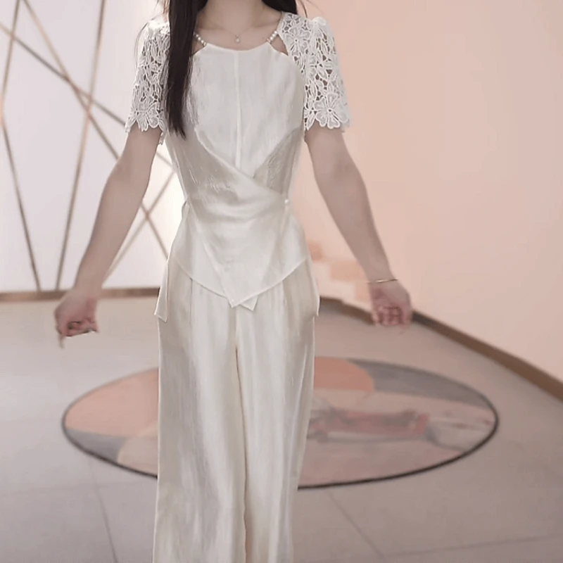 上衣+休闲裤2025夏季新款时尚休闲百搭洋气减龄收腰显瘦白色套装