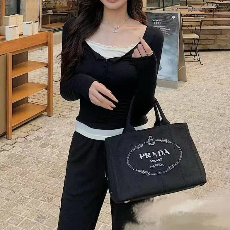 95新 Prada/普拉达 坤球奢选 普拉达黑单宁沙滩斜挎包