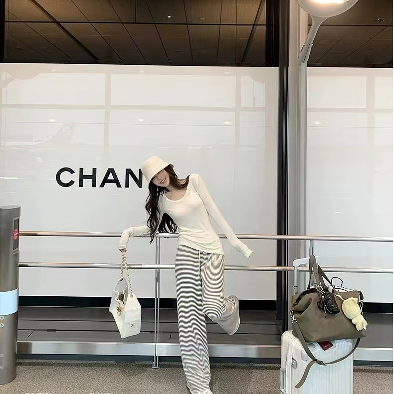 设计感长袖T恤女早秋季2025新款百搭宽松显瘦套头上衣阔腿长裤子