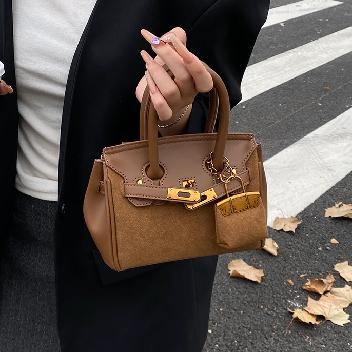 韩系复古手提铂金包包女式2025超火新款轻奢高级感小众设计斜挎包