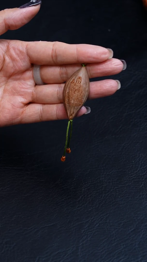 橄榄核吊坠21原皮线雕