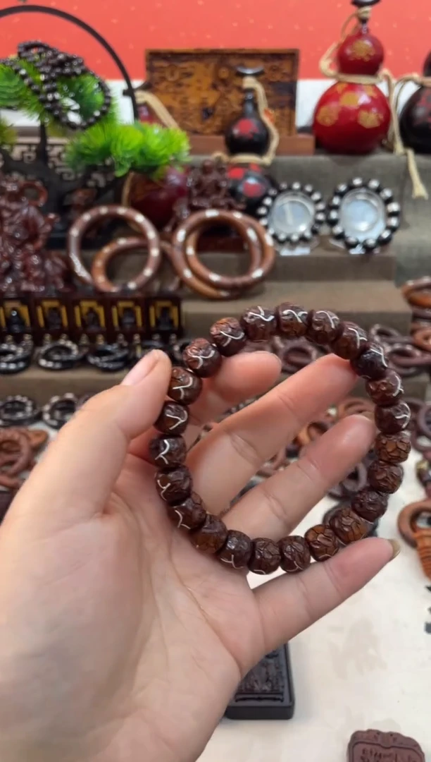 木J****?枣木镶银闪电纹手串