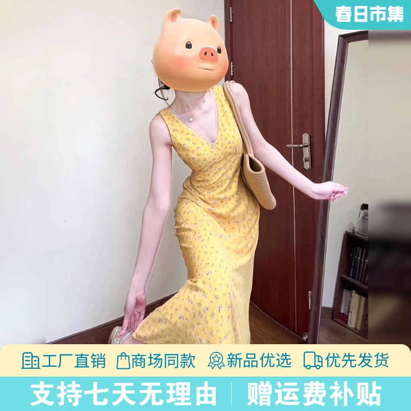 1299黄色v领无袖碎花连衣裙子女2025夏季新款海边度假风收腰长裙