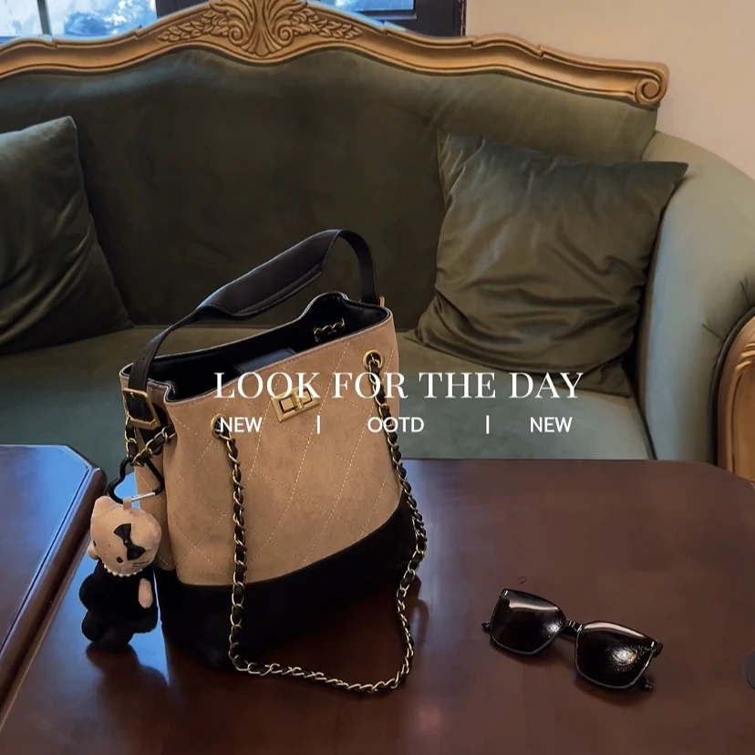 【古堡暖阳】2025新款轻奢麂皮绒水桶女包百搭手提单肩斜挎包软皮包