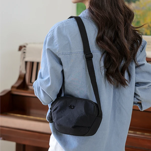 7638多层2025新款潮时尚百搭轻便男女同款布包休闲单肩斜挎手机包