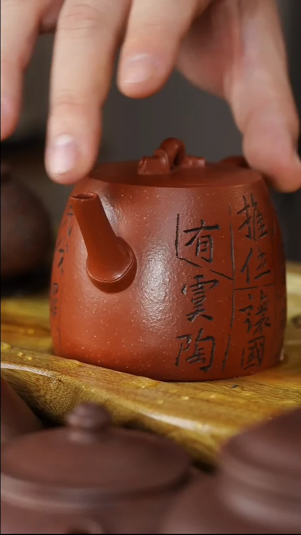 工堂直营精工半手紫砂壶汉铎