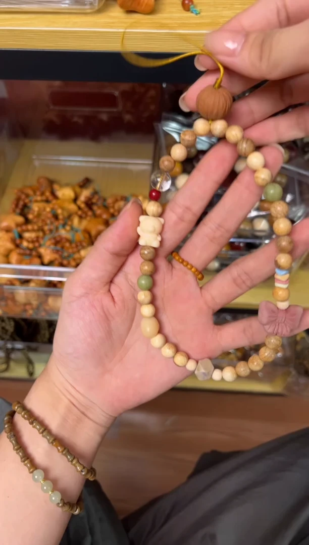 非洲檀香无事牌006咕噜咕噜手机挂老款