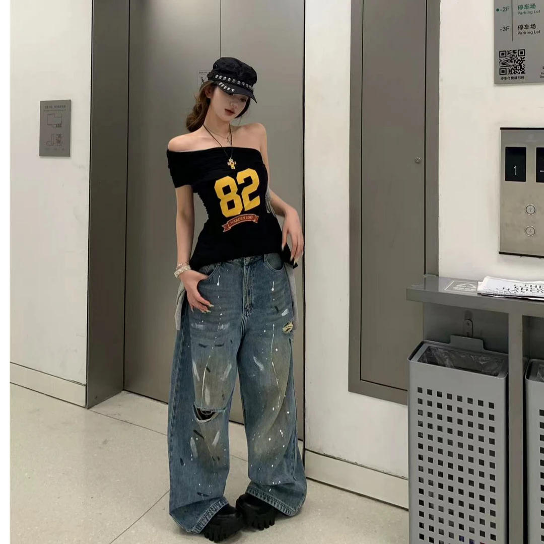 新春女装牛仔裤春游出行衣服网红洋气泼墨破洞辣妹阔腿复古宽松